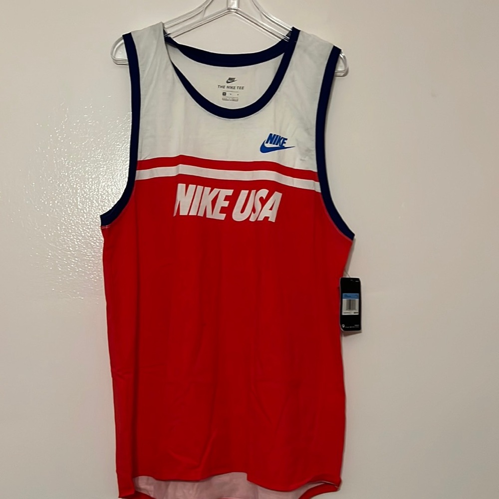Men’s medium Nike USA tank tee. Sizing is more like a Large to XL.